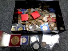 A box of various coins,