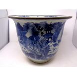 A Chinese blue and white planter depicting traditional scenes, width 37.