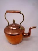 A 19th century copper and brass teapot