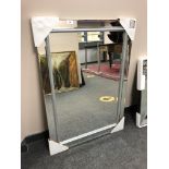 An all glass mirror with box corners