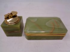 An onyx cigarette box with lighter