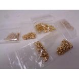 A quantity of gold plated jeweller's findings