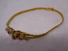 A 9ct gold ruby and diamond bracelet