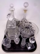 A tray containing assorted glassware to include whisky and liqueur decanters, glass comport, bowl,