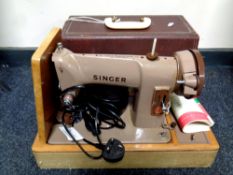 A 20th century Singer electric sewing machine in case