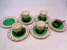 Eight pieces of antique Aynsley coffee china together with five silver coffee cup holders