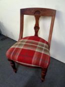 A 19th century carved mahogany dining chair