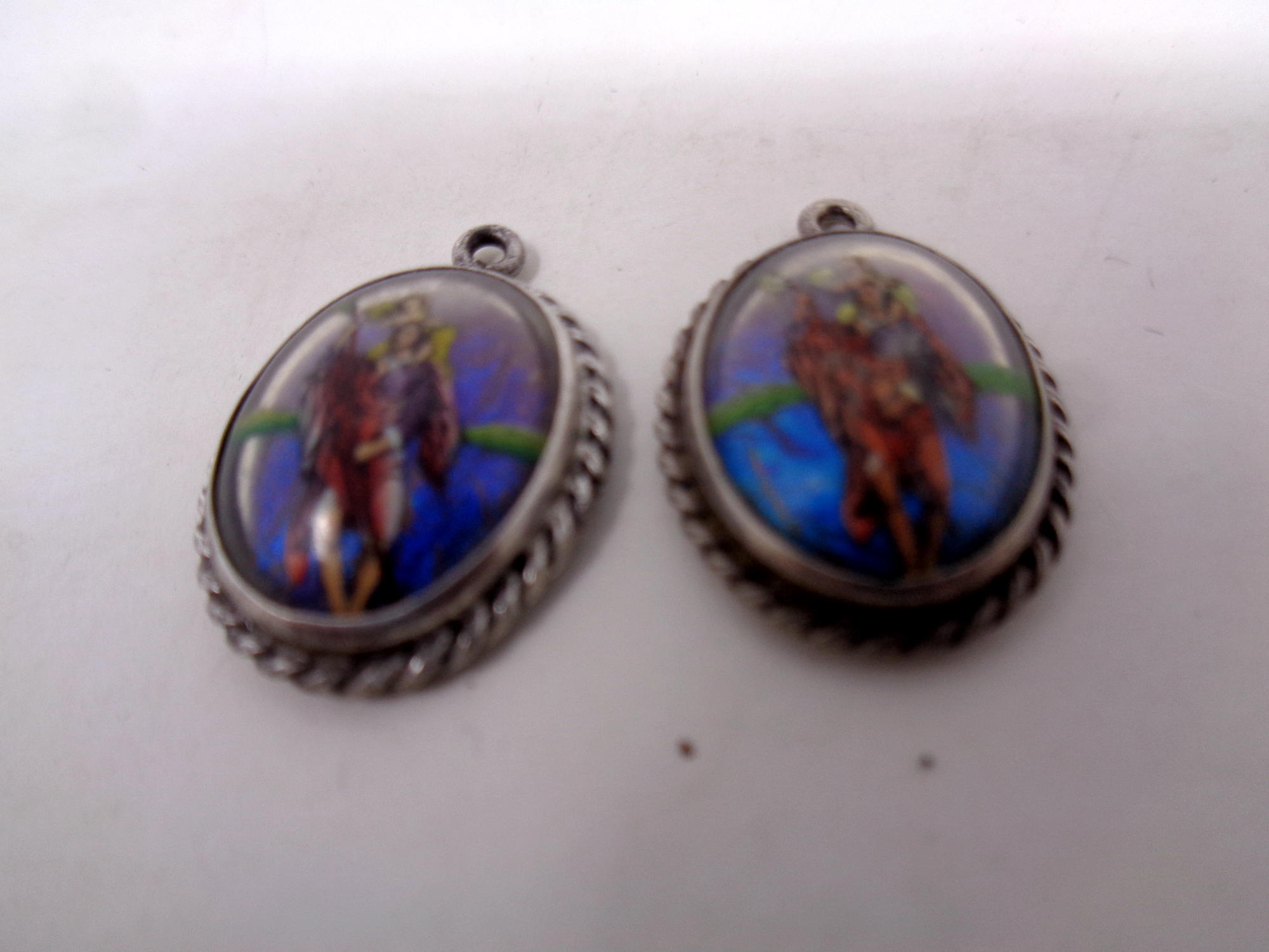 Two silver pendants