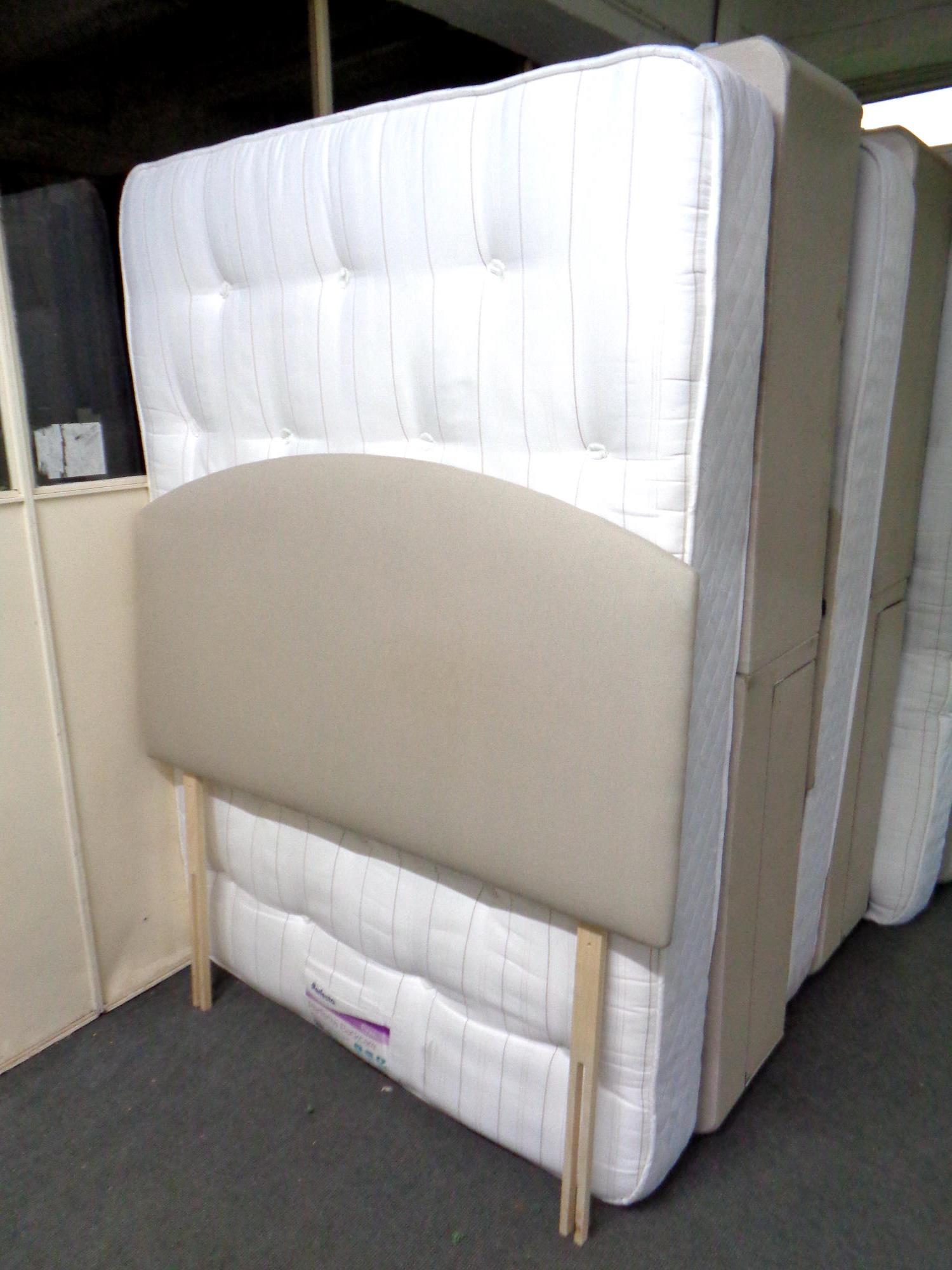 A 4'6 storage divan set with Perfecta Back Care firm mattress