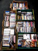 Five boxes and crates containing a large quantity of assorted DVDs