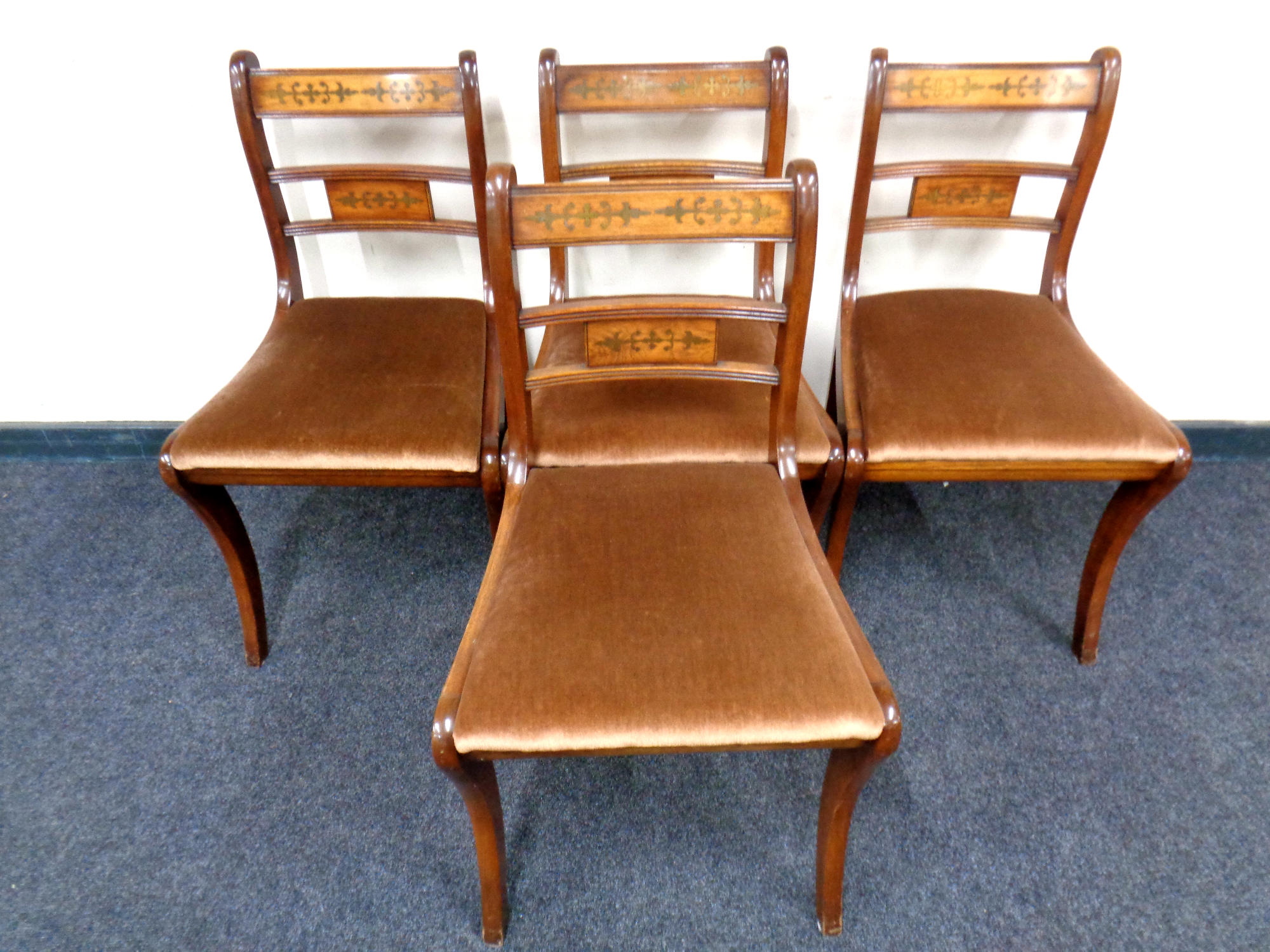 A set of four Reprodux Regency style dining chairs