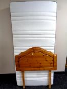 A 3ft memory foam mattress with pine headboard