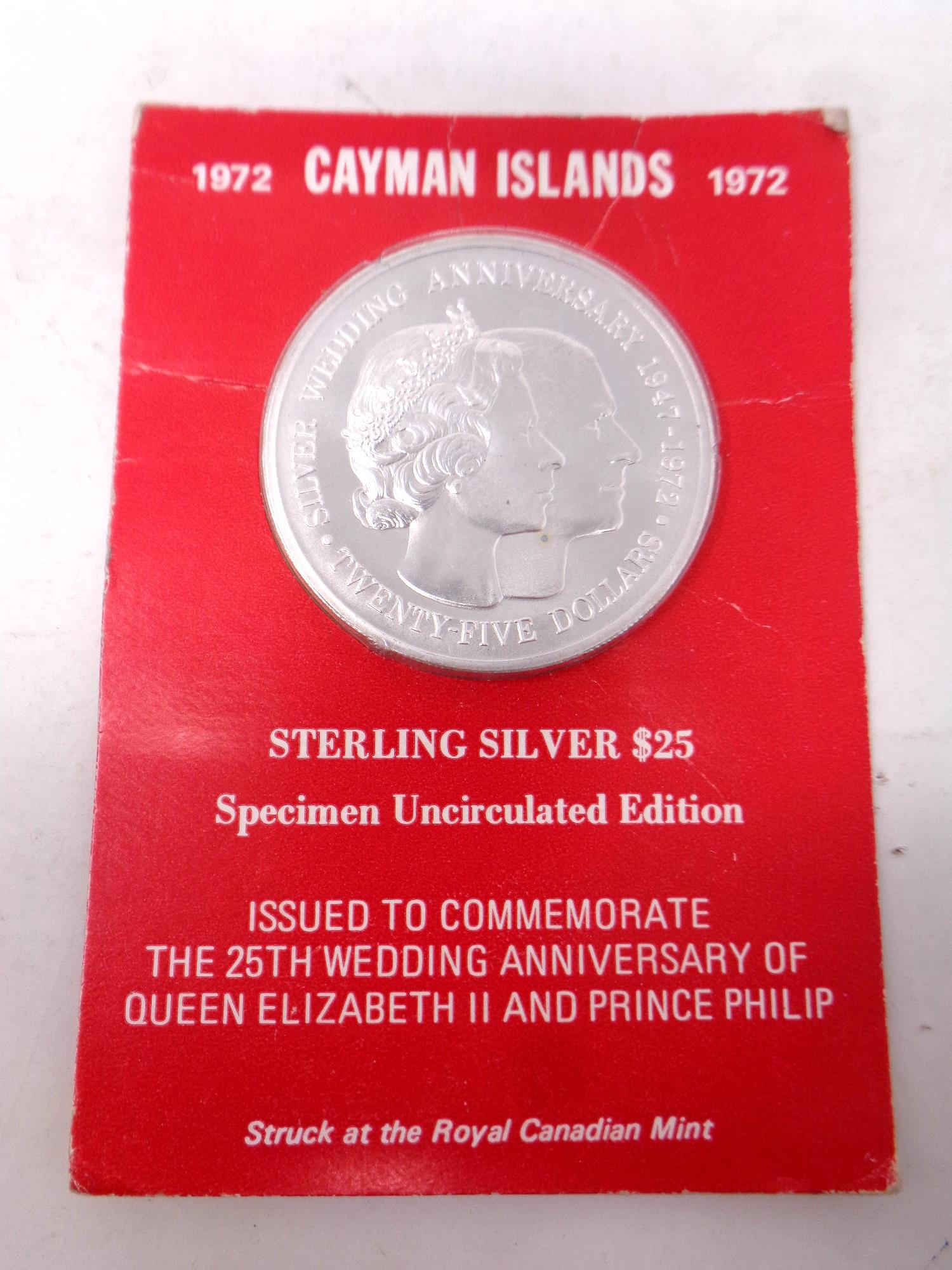 A silver $25 Cayman Islands coin