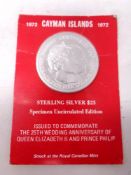 A silver $25 Cayman Islands coin