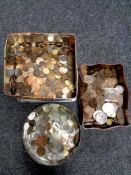 A large quantity of coins in three tins including silver Victorian and other crowns,