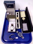 A tray containing a collection of gent's boxed and unboxed wristwatches to include Nautica,