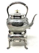A silver plated spirit kettle on stand