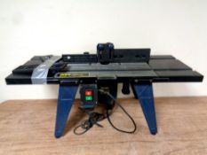 A Power Craft PRT-150 router table with router