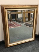 A modern mirror in golden frame