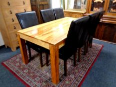 A sheesham wood dining table, length 175 cm,