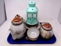 A tray containing fifteen pieces of Japanese eggshell tea china together with a metal tea light