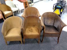 Four gold loom basket chairs