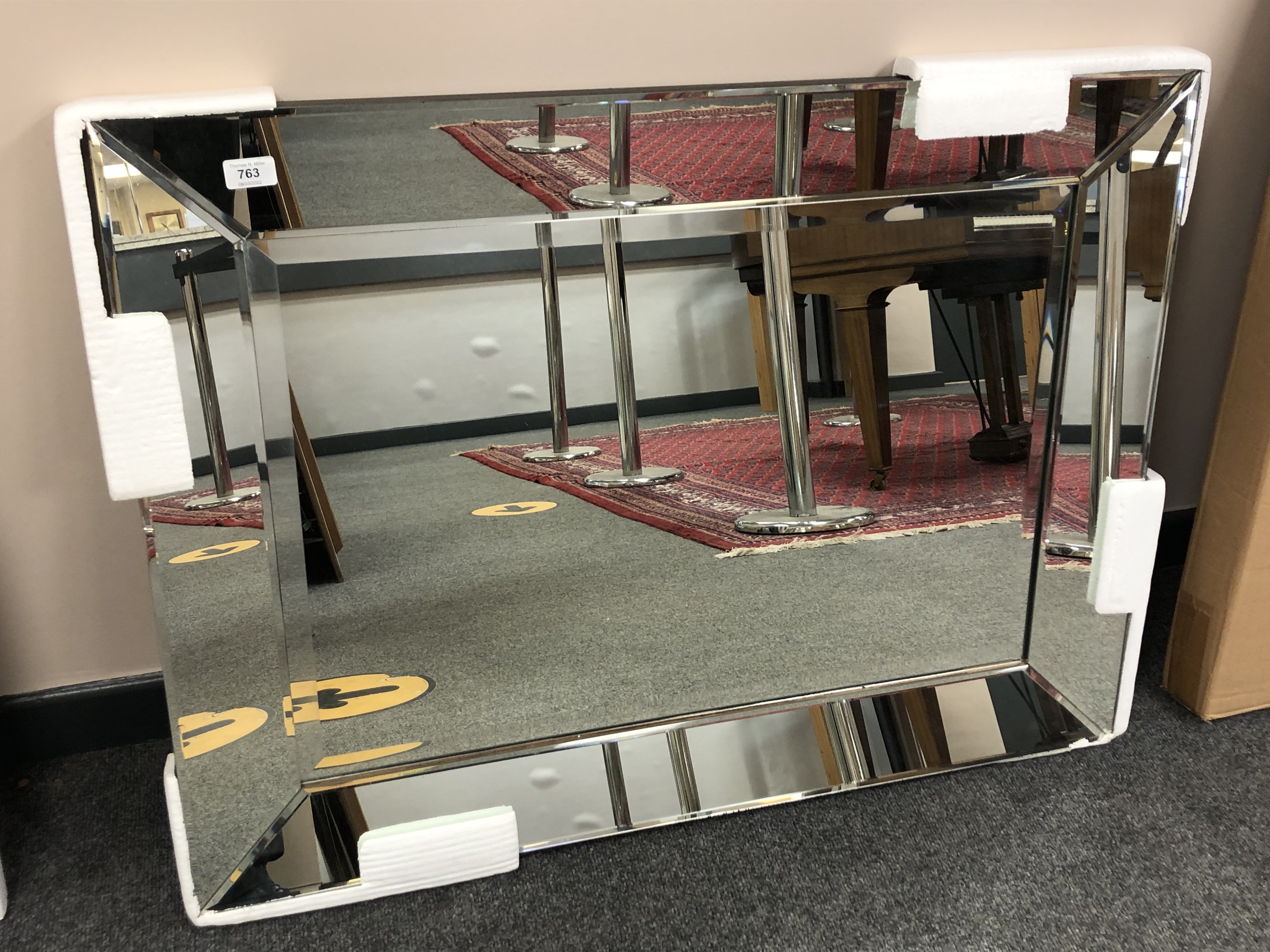 An all glass mirror