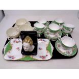 A tray containing assorted ceramics to include Art Deco bookend, seven pieces of Belleek china,