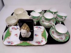 A tray containing assorted ceramics to include Art Deco bookend, seven pieces of Belleek china,