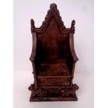 A 1953 Queen Elizabeth II Harper cast iron coronation money box in the form of a throne