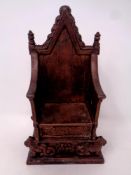 A 1953 Queen Elizabeth II Harper cast iron coronation money box in the form of a throne