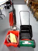 A Qualcast Panther 30 push lawn mower together with a vintage Kirby vacuum