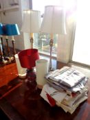 Two pairs of table lamps with shades, red glass table lamp and shade,