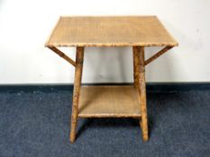 A Victorian bamboo two tier table, with basket weave top.