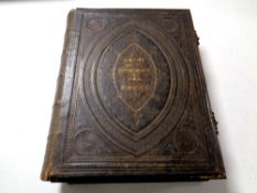 A Victorian holy bible with metal mounts