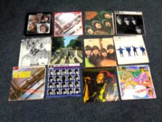 Twelve vinyl records to include The Beatles Let It Be, Revolver, Please Please Me,