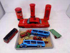 A collection of die cast and tin plated toys including money boxes,