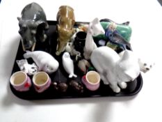 A tray of animal ornaments, cats, elephants,