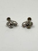 A pair of 9ct white gold part-diamond earrings. CONDITION REPORT: 4g.