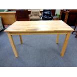 A contemporary oak office table fitted three drawers,