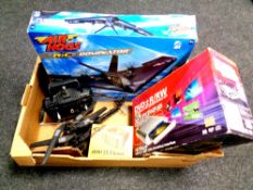 A box containing Air Hogs Dominator remote controlled aircraft together with a further remote