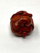 A Japanese carved fruitwood netsuke - Rats on a pumpkin.