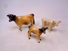 Three Beswick calf figures (3)