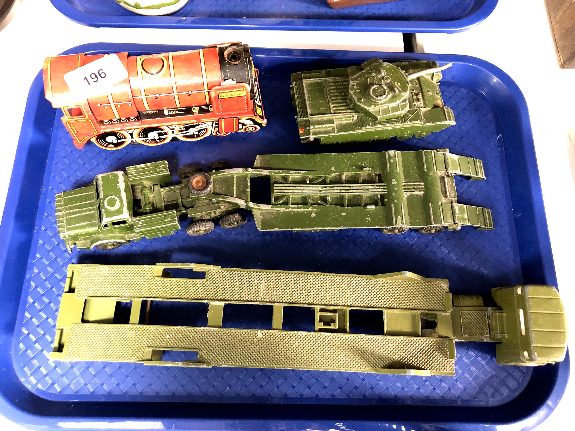 A tin plated clockwork Britannia locomotive engine together with a Dinky Centurion tank and two