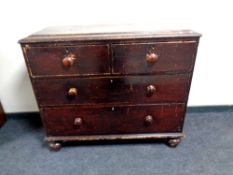 A Victorian stained pine chest of four drawers,