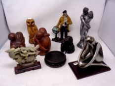 A collection of contemporary ornaments, figures, elephant ornament on stand,