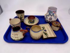 A Poole Pottery vase together with a collection of Torquay mottoware