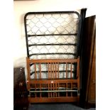 An early 20th century 3ft 6' bed frame with metal interior