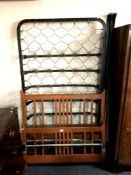 An early 20th century 3ft 6' bed frame with metal interior
