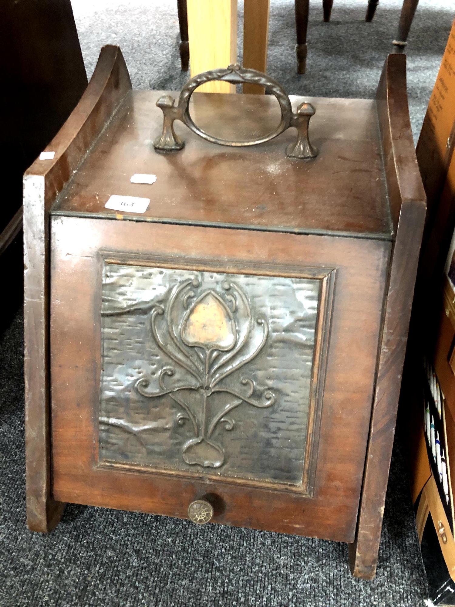 An Edwardian Art Nouveau style coal box